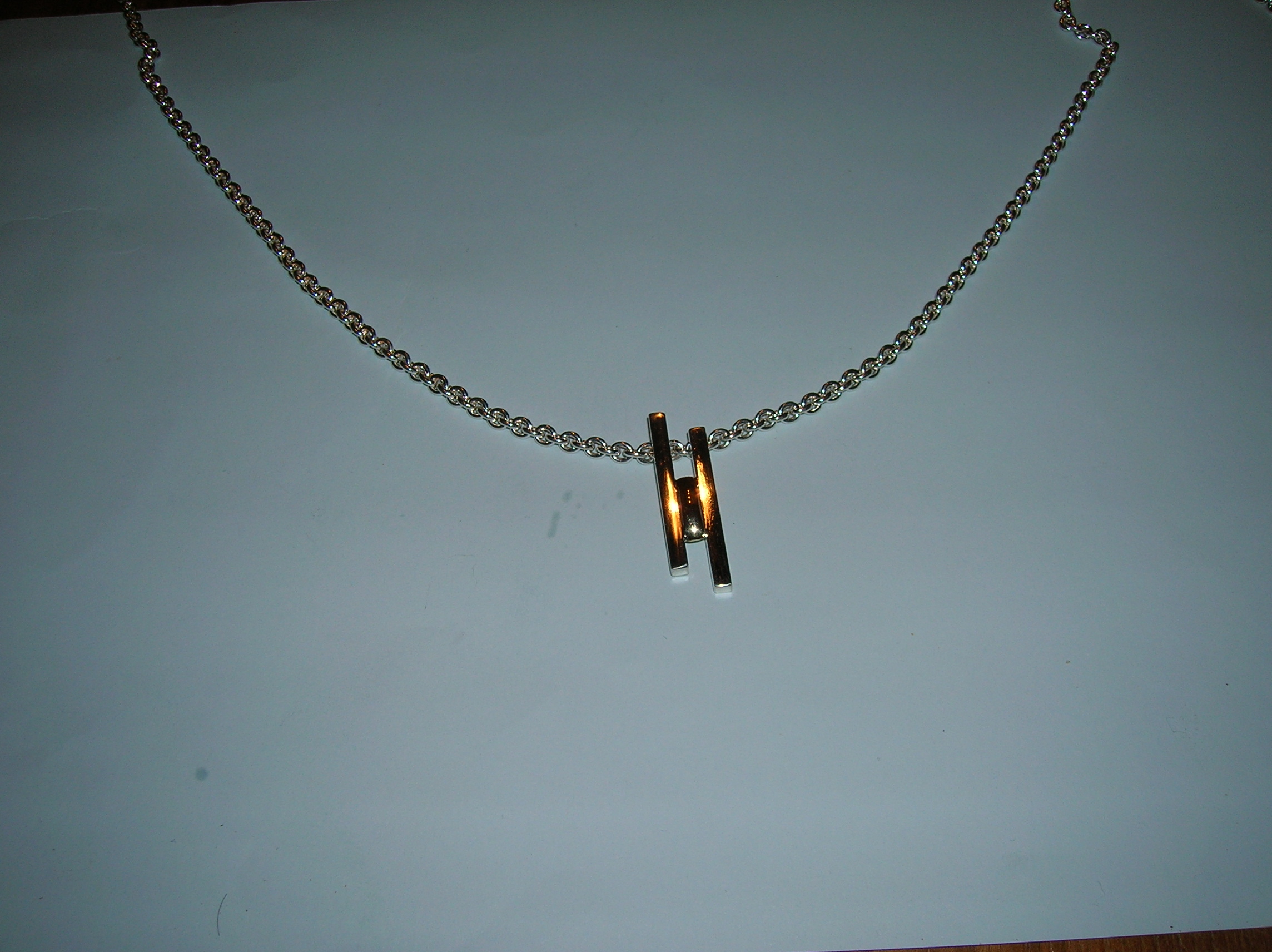 gedenksieraad ketting goud en zilver